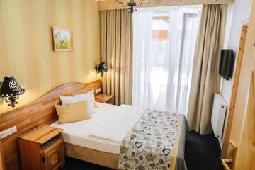 Фото номера Номер Делюкс с террасой Отель Hotel Bajka г. Grodziec 3